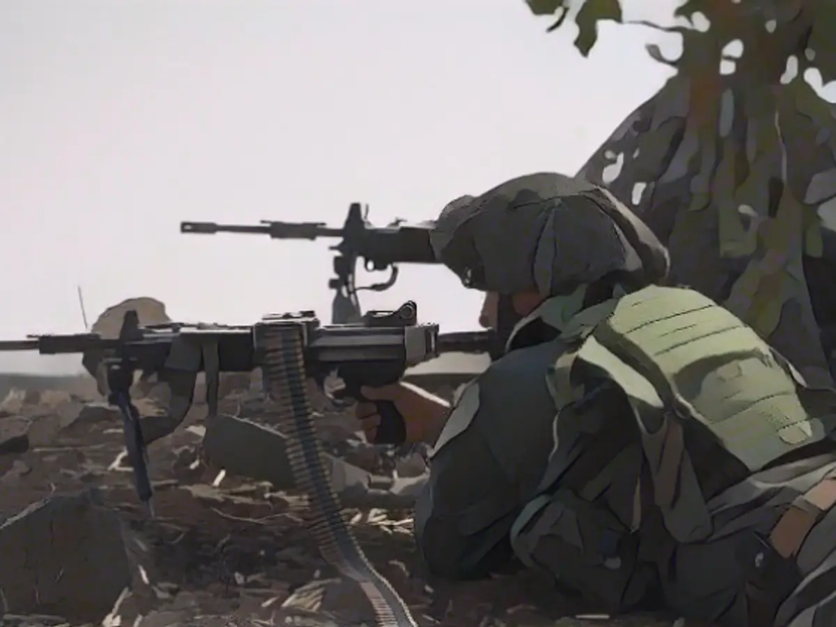 Israeli troops stand in the center of Hamas stronghold