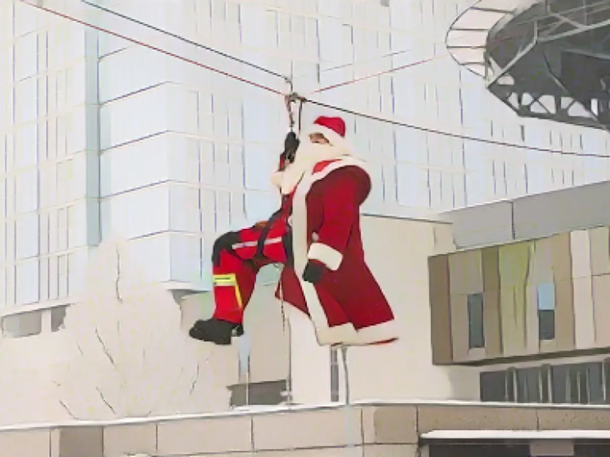 St. Nicholas climbs onto the roof of the children's clinic