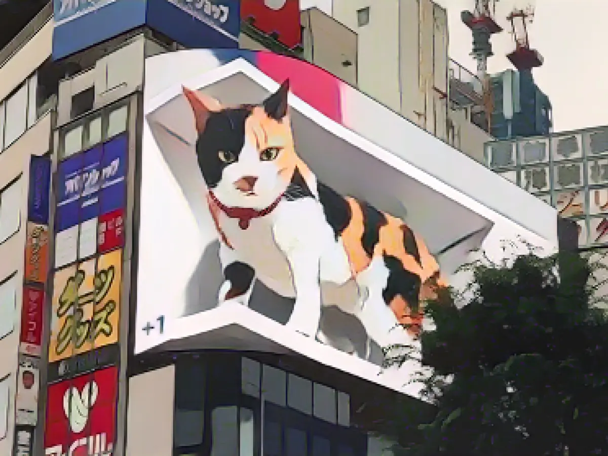 A giant 3D cat takes over one of Tokyo's largest billboards