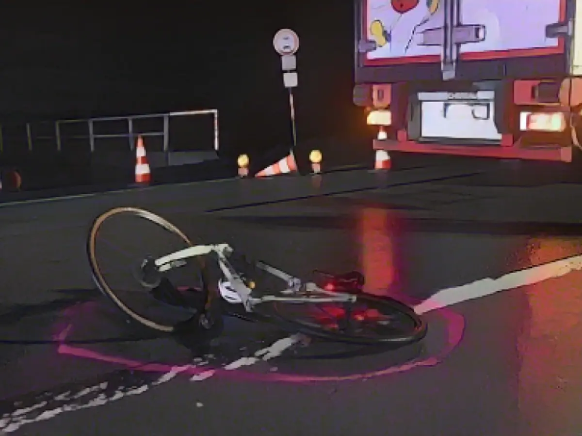 Articulated truck runs over mountain biker