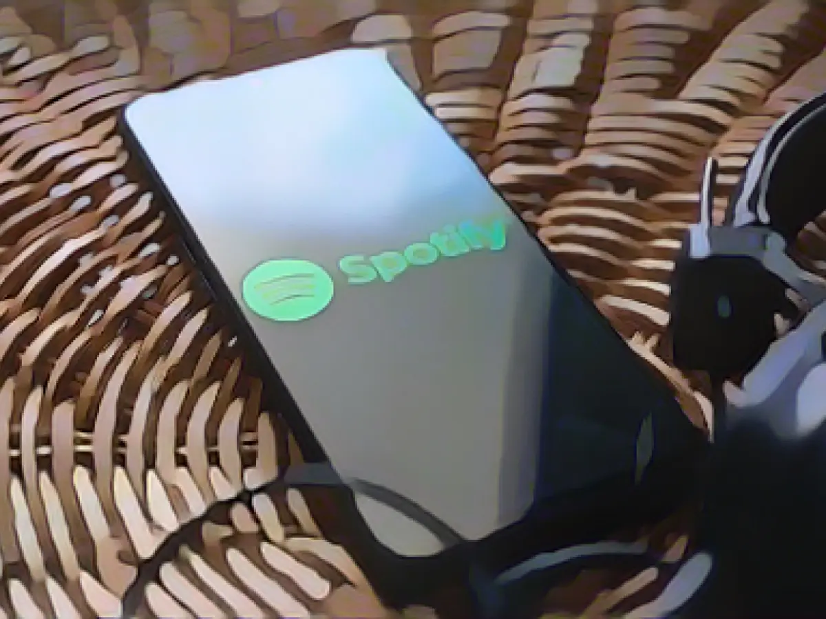 Spotify is cutting jobs to move faster into artificial intelligence — and Wall Street welcomes it