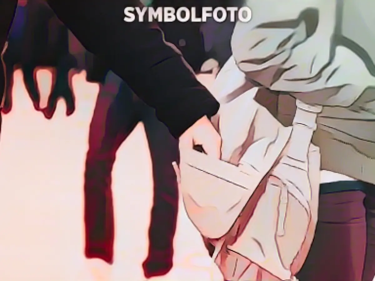 Teenagers threatened with a weapon