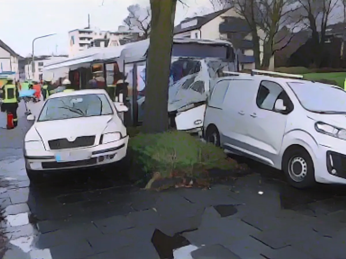 Bus with pupils rams into several cars