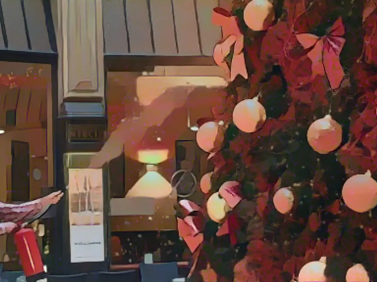 Last generation sprays fir trees with orange paint