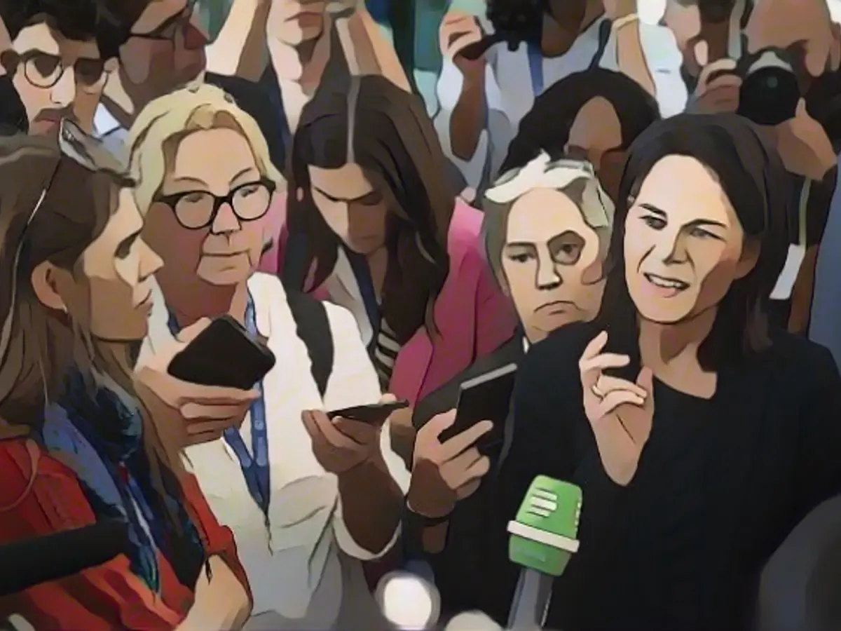 Baerbock cheers COP agreement - climate activists disappointed