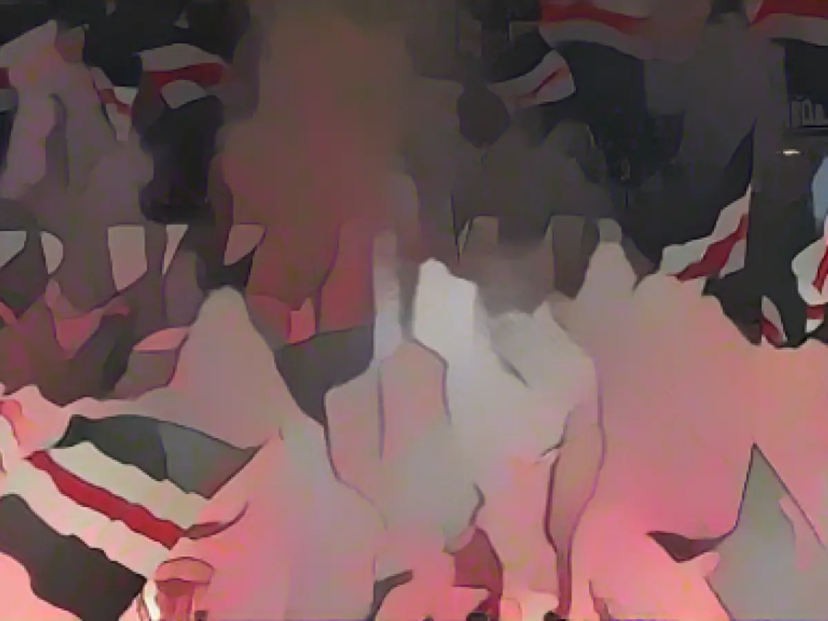 Fine and fan exclusion on probation for Eintracht