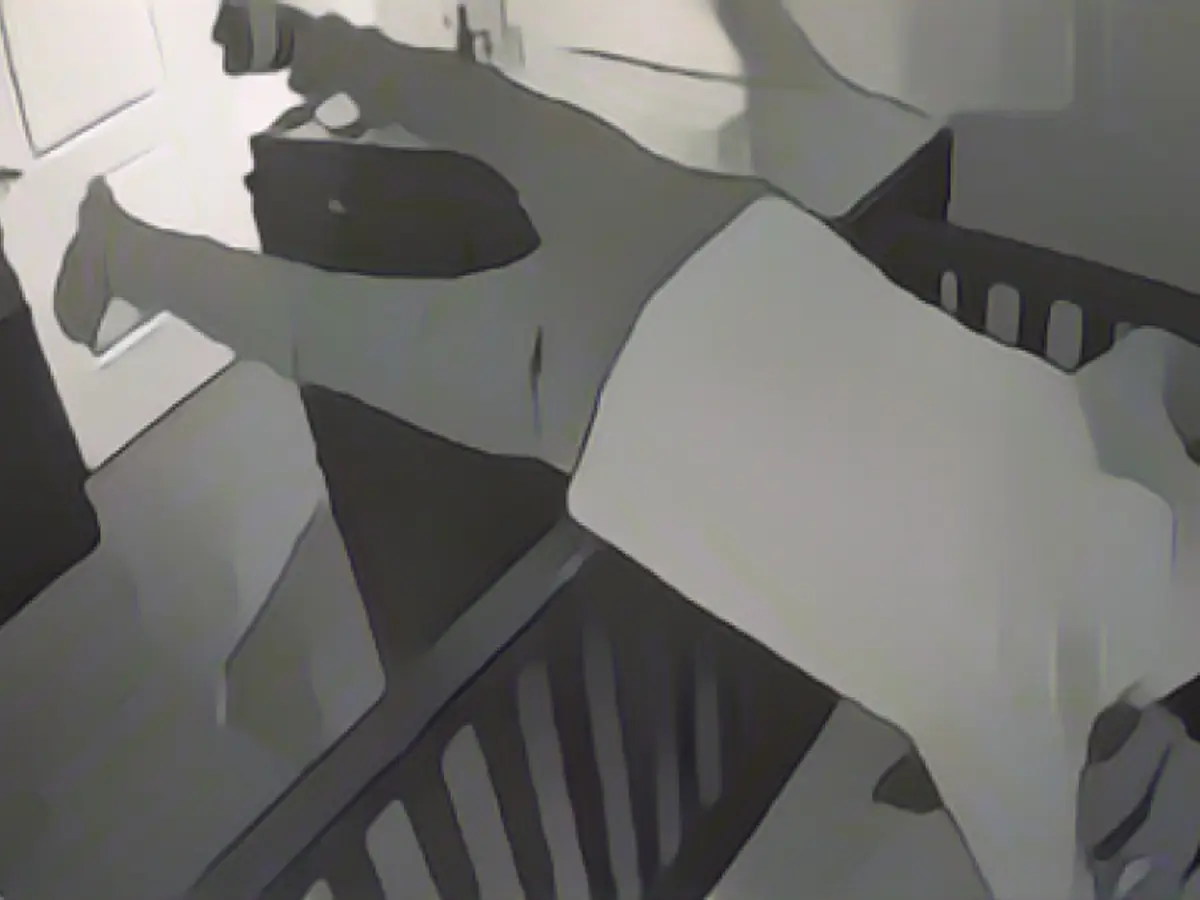 Lost his balance: Grandpa tries to put his granddaughter to bed - and fails big time