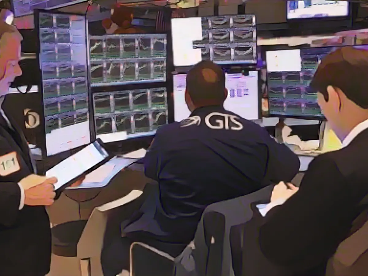 Fed cuts interest rates, Dow hits record high