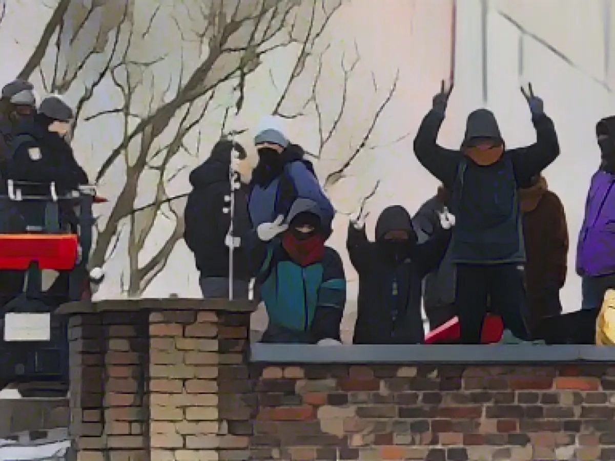 Activists still on the roof of occupied print shop