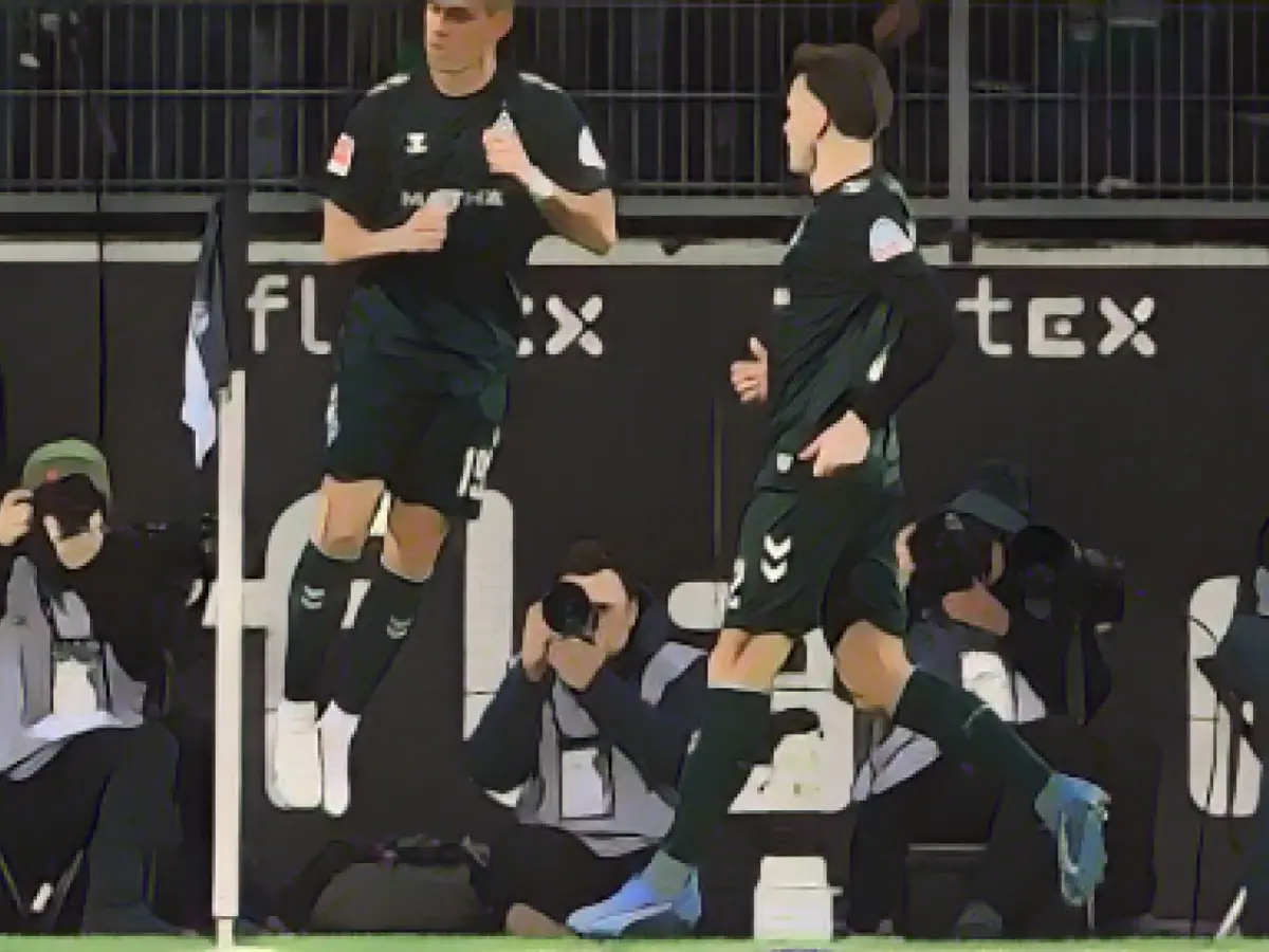 Bundesliga match in Gladbach interrupted after fan protests