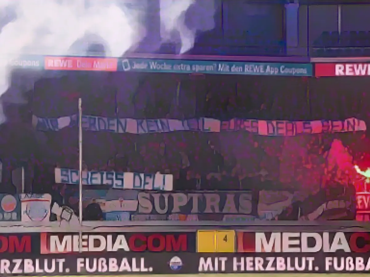 Silence, pyrotechnics and coins: Fans protest against the DFL