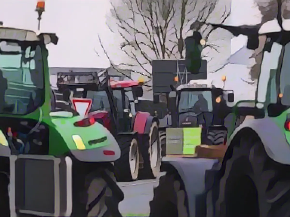 Around 350 farmers protest against cost-cutting plans