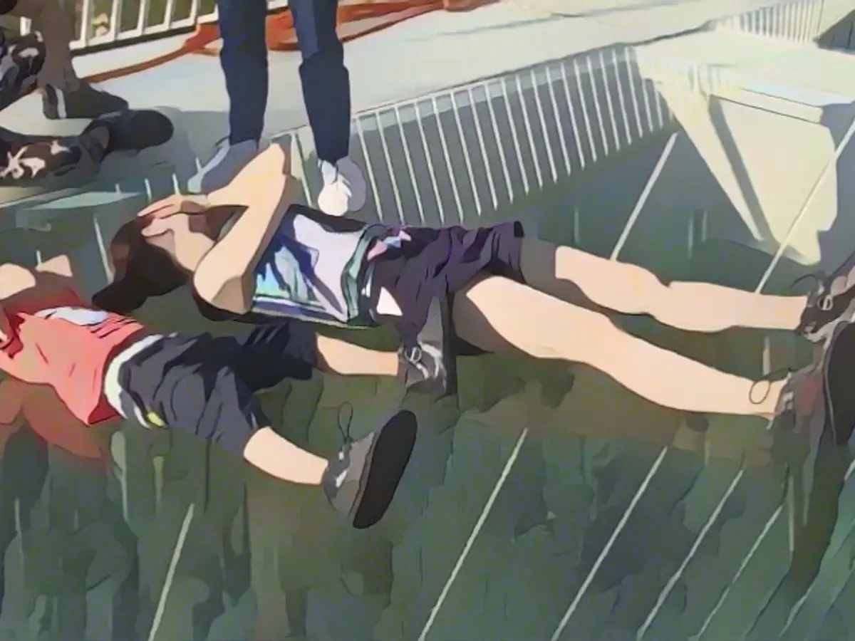 China's tallest and longest glass bridge opens in Zhangjiajie Grand Canyon