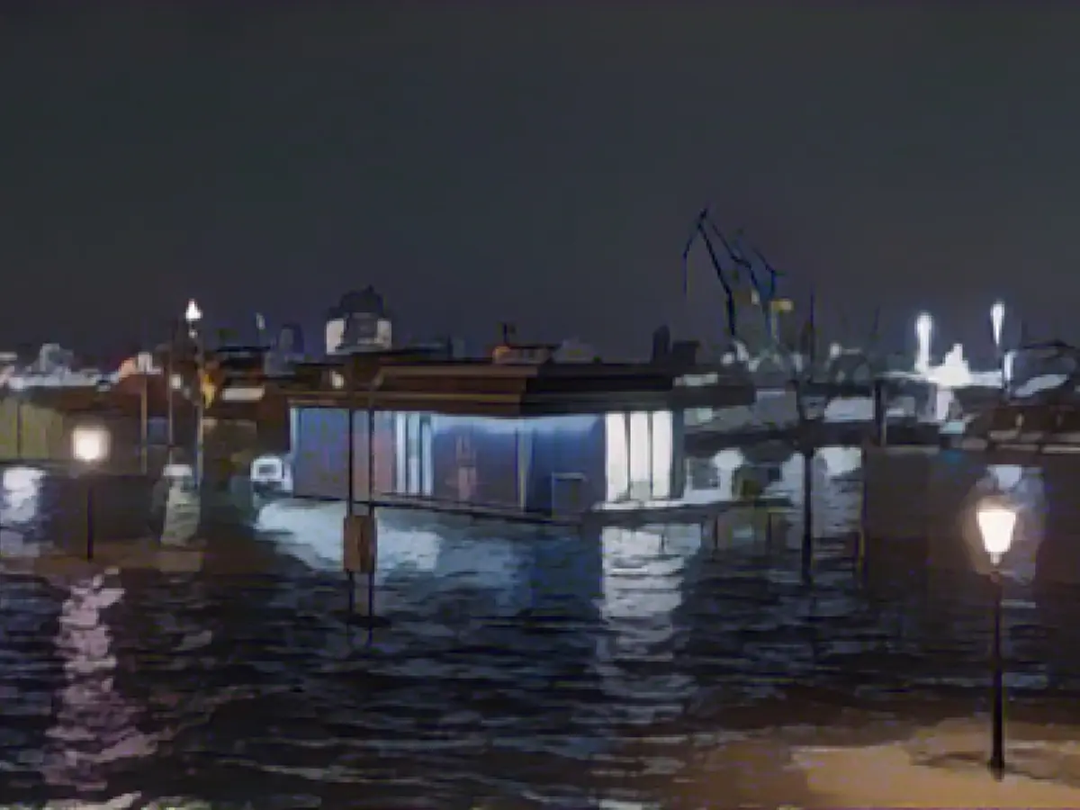 Warnings of persistent flood risk and storm surges